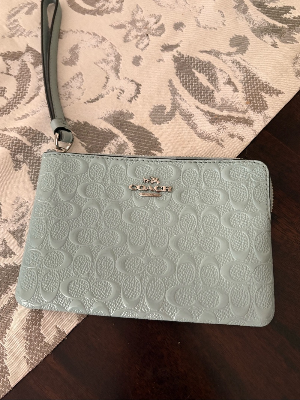 Coach Light Blue Embossed Signature Wristlet